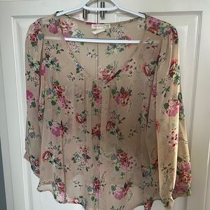 Womens top . It is sheer , need to wear cami underneath